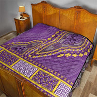 Lavender quilt with yellow dashiki stripe center and patterned purple patch corners