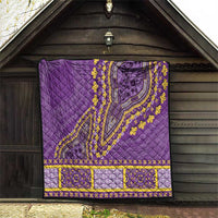 Purple quilt blanket with yellow medallion design and geometric edge border