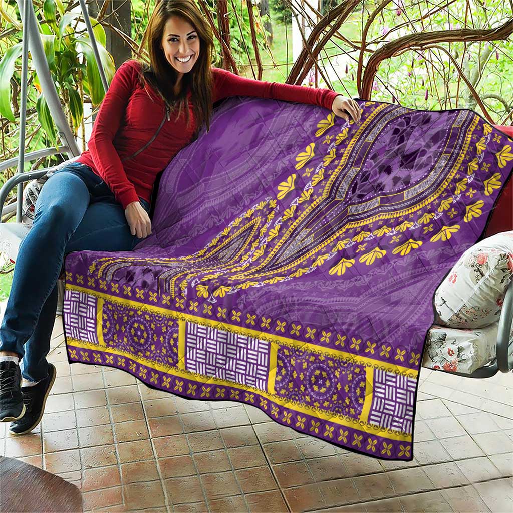 Purple dashiki quilt with yellow motifs, curved central pattern, and patterned hem strip