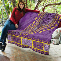 Purple dashiki quilt with yellow motifs, curved central pattern, and patterned hem strip