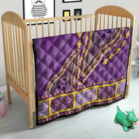Purple quilt blanket with yellow dashiki-style center medallion and geometric border panels