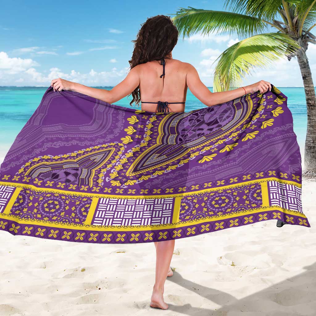 African dashiki sarong worn as beach wrap, violet purple with yellow motifs and border, back view