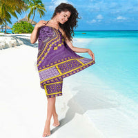 African dashiki sarong in violet purple with yellow dashiki print, worn one-shoulder wrap