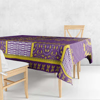 Purple patterned dashiki tablecloth with gold and white medallions and corner drape