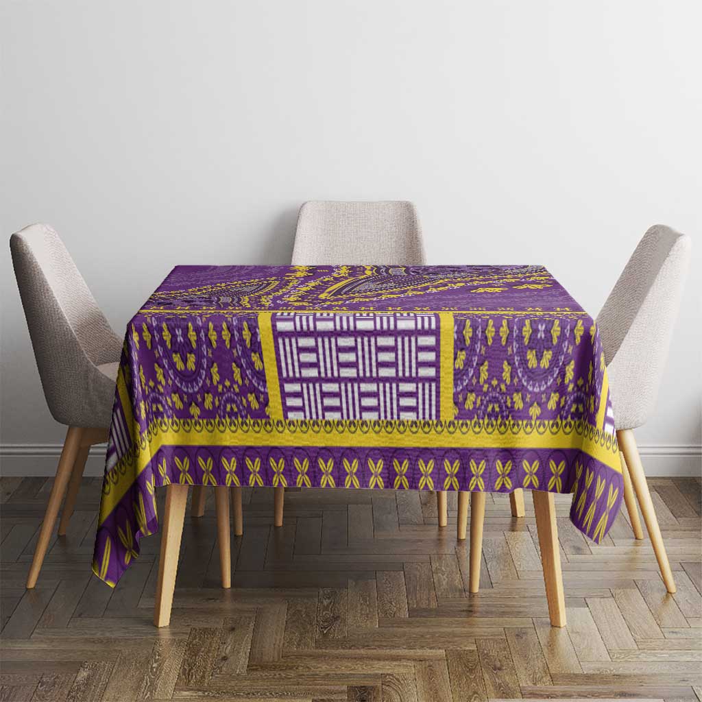 Rectangular purple dashiki tablecloth with gold trim and a white geometric center band