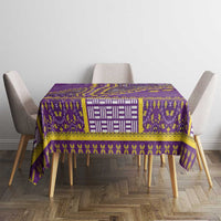 Rectangular purple dashiki tablecloth with gold trim and a white geometric center band