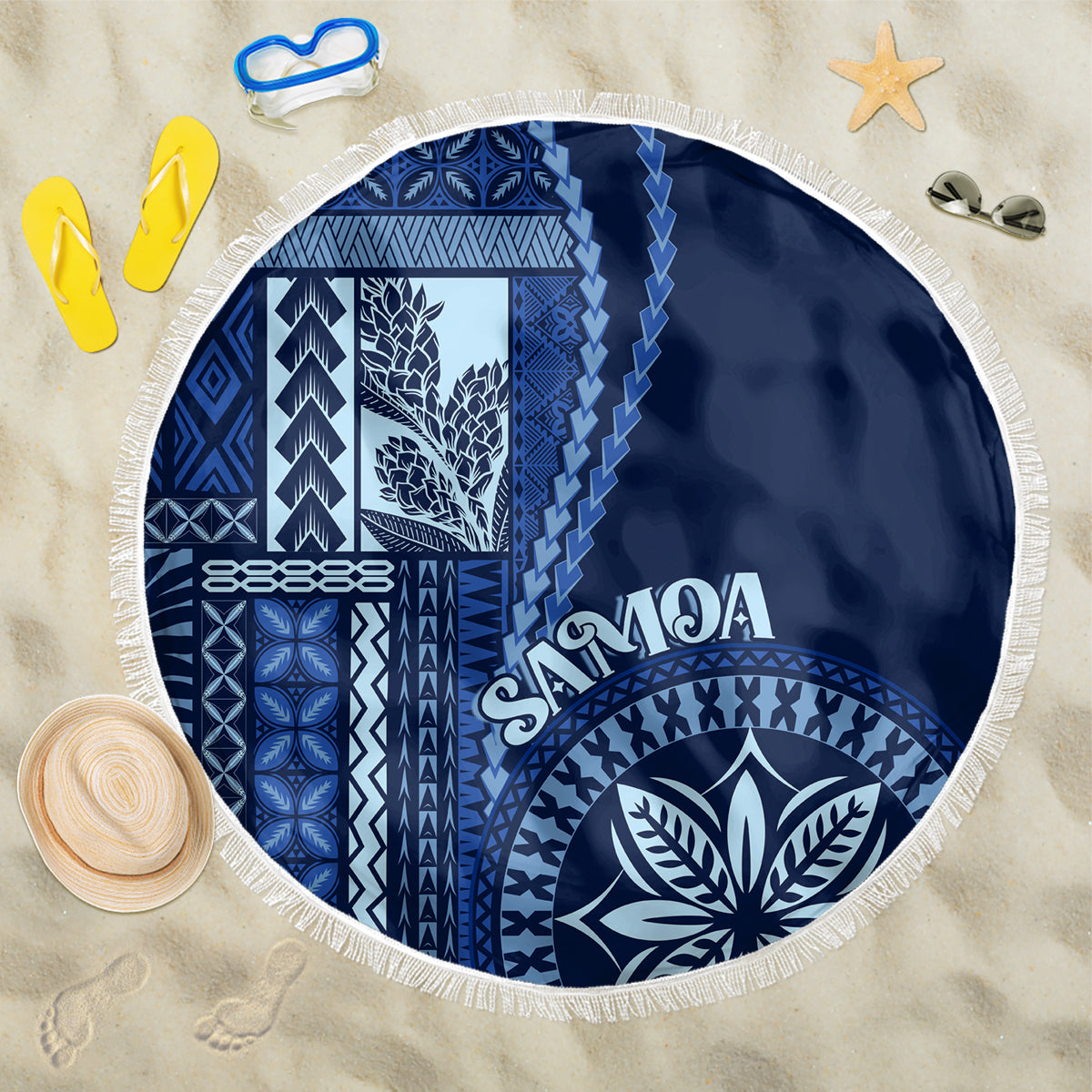 Round beach blanket in blue and white with white fringe and Siapo motif pattern