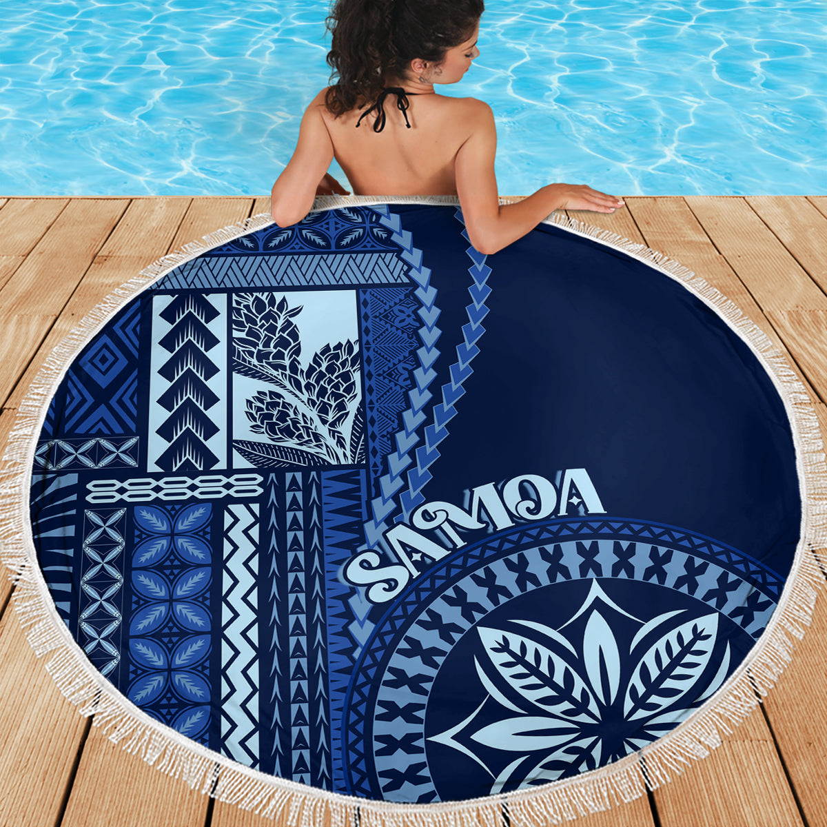 Round beach blanket, blue and white Siapo motif design with white fringe border