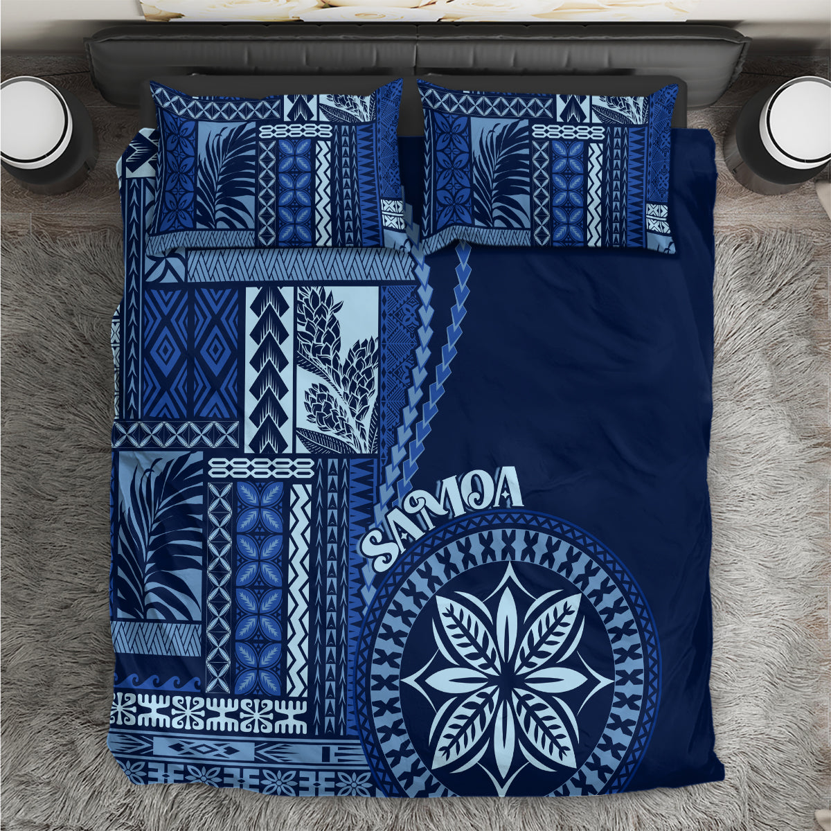 Blue siapo motif bedding set with navy logo circle and patterned pillowcases