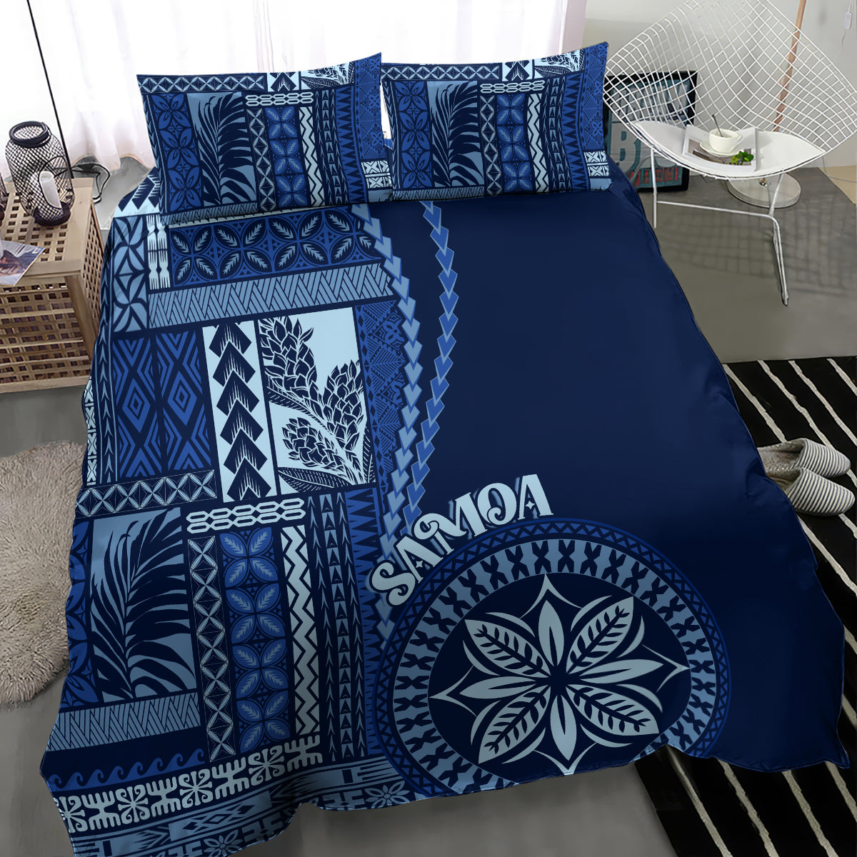 Blue siapo motif bedding set, navy cover with Samoa leaf emblem and geometric borders