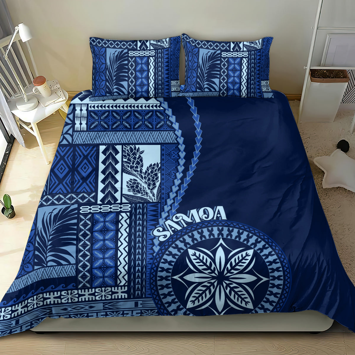 Blue siapo motif bedding set with patterned panels, navy cover, and leaf logo on bed