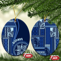 Two blue and white ceramic Samoa siapo motif hanging ornaments with gold cords