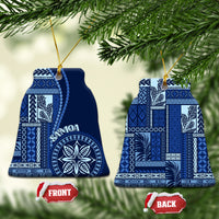 Two blue and white ceramic Samoa siapo motif ornaments with front and back tags