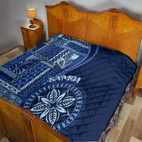 Navy blue and white quilted bedding cover with Samoa siapo panel and round floral design