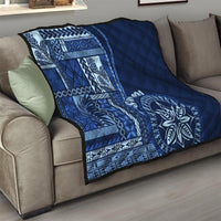 Navy blue quilt throw with Samoa siapo geometric print panels and round floral medallion