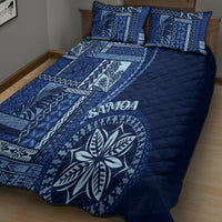 Blue siapo motif quilt bed set with quilted texture and leaf emblem on bedspread