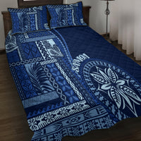Blue siapo motif quilt bed set with quilted texture and large circular leaf emblem