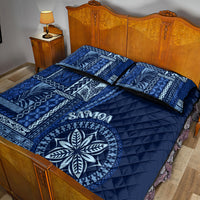 Blue siapo motif quilt bed set with patterned panel, quilted sides, and circular leaf emblem