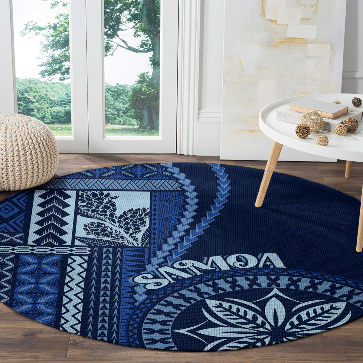 Round blue rug with white geometric panel and large leaf emblem, “Samoa” text