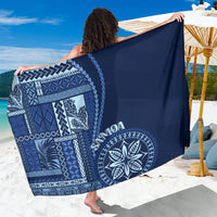 Navy blue Samoa siapo motif sarong with geometric pattern and circular emblem
