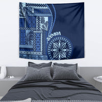 Blue Samoa siapo tapestry featuring patterned left panel and round floral emblem