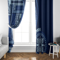 Blue window curtain pair: patterned panels on left and solid dark-blue panel on right