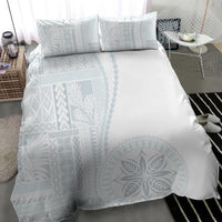 White duvet set with large circular floral siapo print and two matching pillowcases