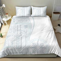 White duvet set with light-blue block and wave siapo patterns, two matching pillowcases