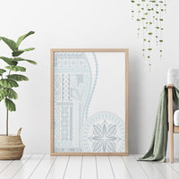 Light-wood framed white and light-blue siapo-style canvas wall art, oval leaf design
