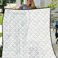 White quilt with diamond-pattern stitching and dark border trim, full cover blanket