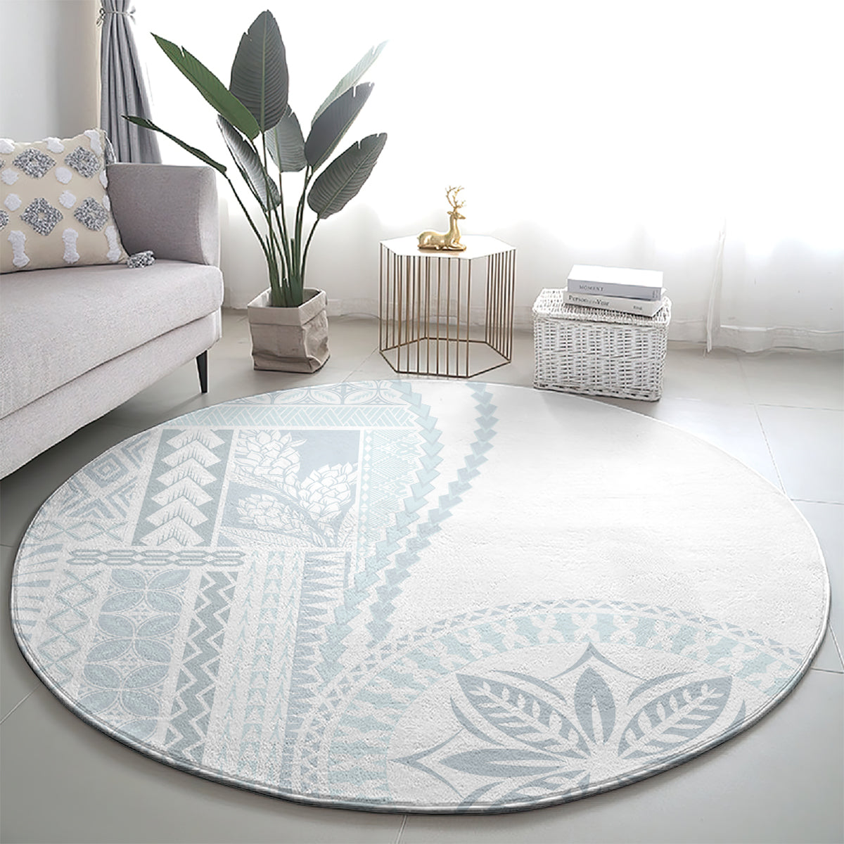 Round light-gray carpet with large blue leaf medallion and geometric print