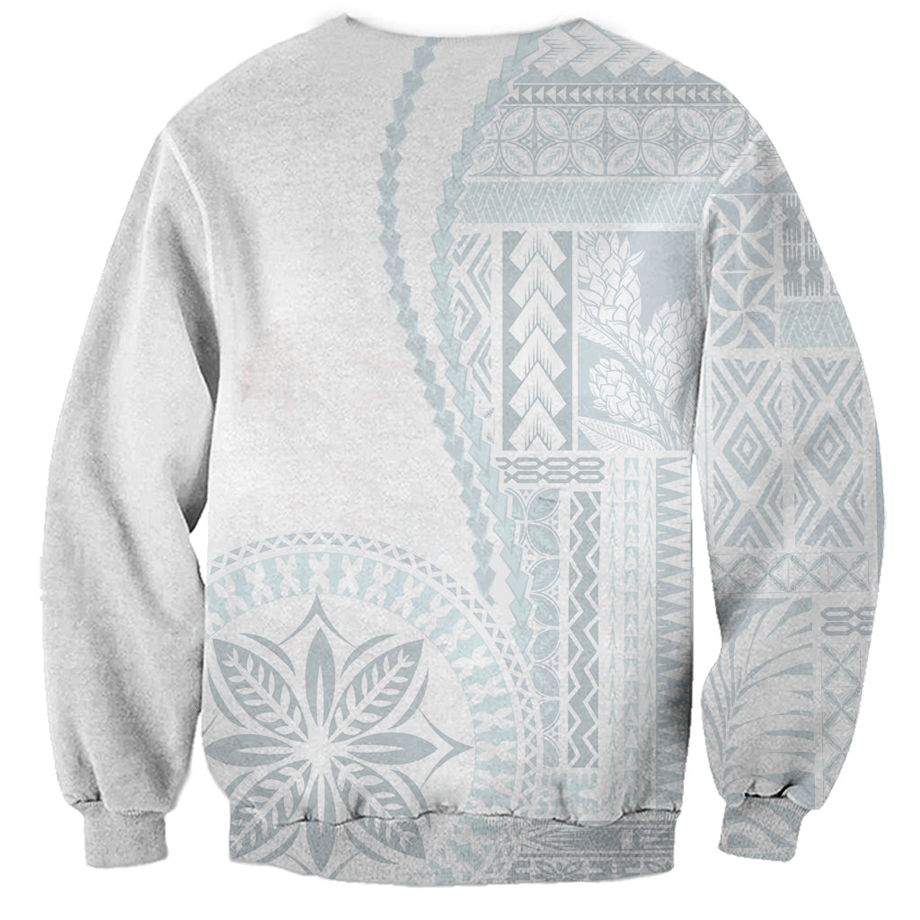 White sweatshirt with light-blue Siapo-style back print, crew neck, ribbed cuffs.