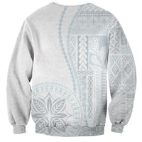White sweatshirt with light-blue Siapo-style back print, crew neck, ribbed cuffs.
