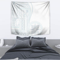 White siapo-style tapestry featuring light blue woven patterns and a large circular motif