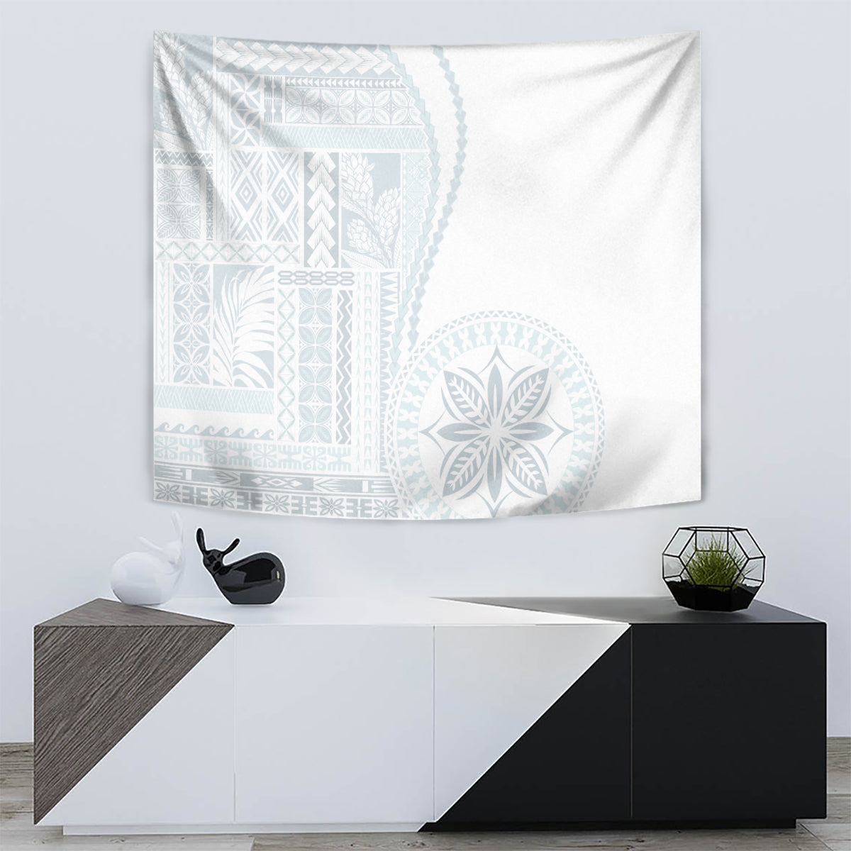 White siapo-style tapestry with light blue rectangular blocks and leaf-like rosette design