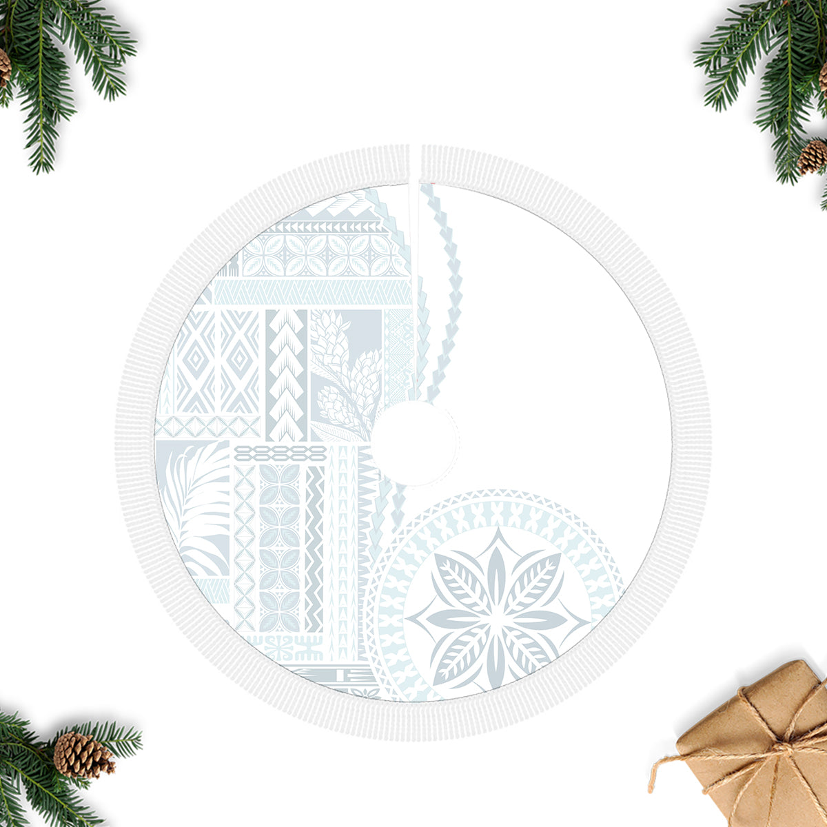 White and light-blue tree skirt with decorative siapo-style print and center opening.