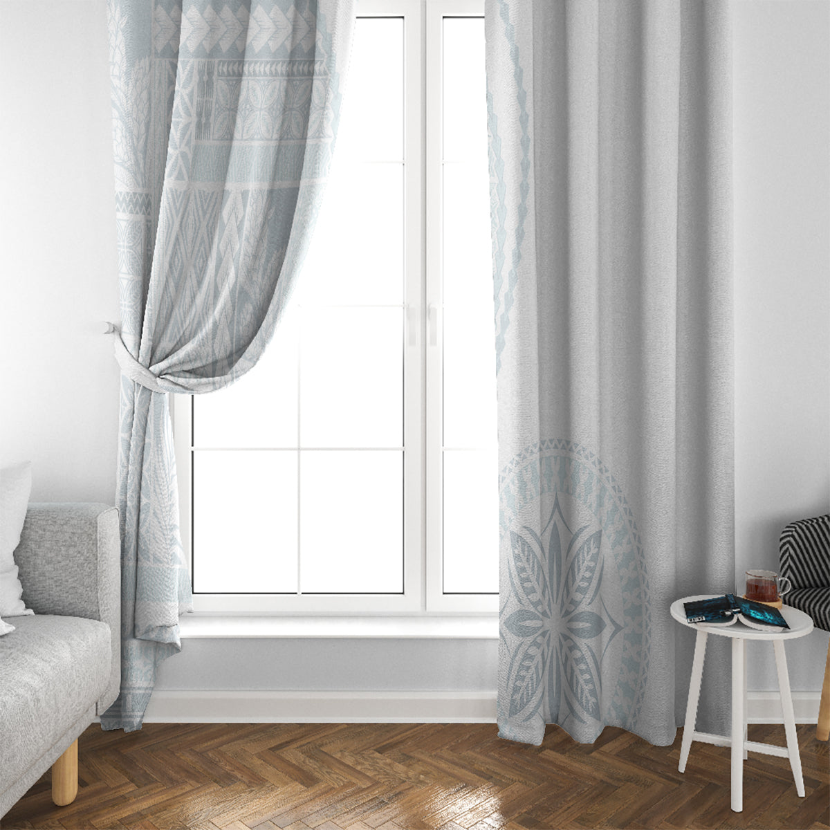 White window curtains with light blue siapo-style leaf motif near the hem and side panel