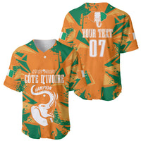 Pair of orange and green custom baseball jerseys: front with elephant text, back with 07