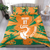 Orange and green geometric duvet set with elephant artwork and two matching pillowcases