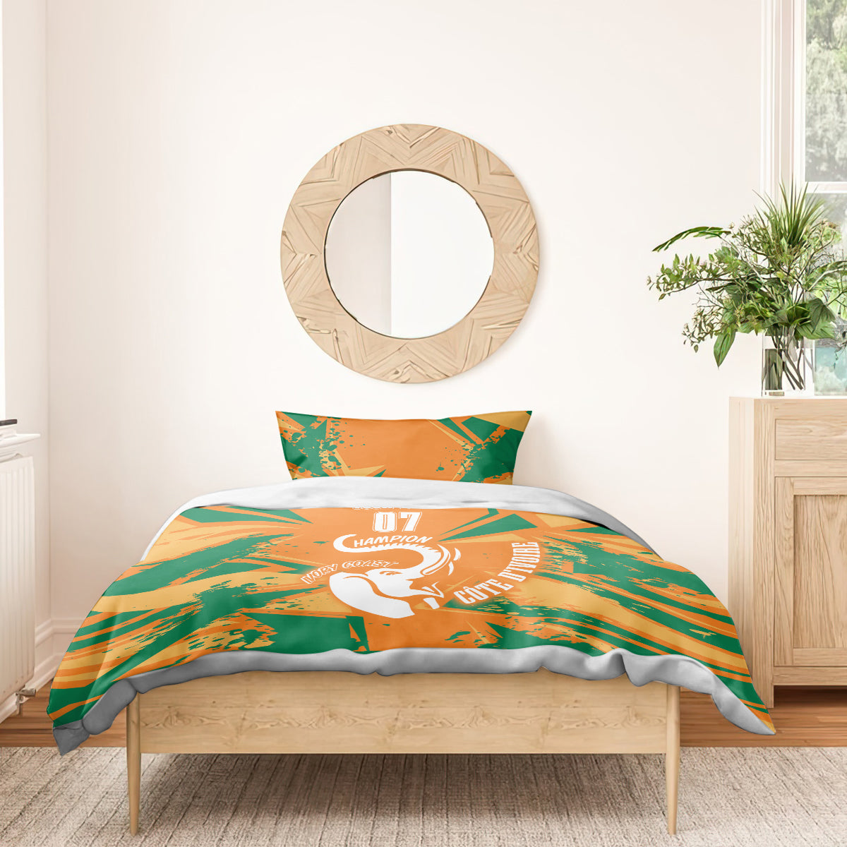 Orange and green geometric duvet and pillow set with elephant graphic in a bedroom