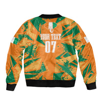 Unisex bomber jacket with back print 'YOUR TEXT 07', orange/green pattern, ribbed hem