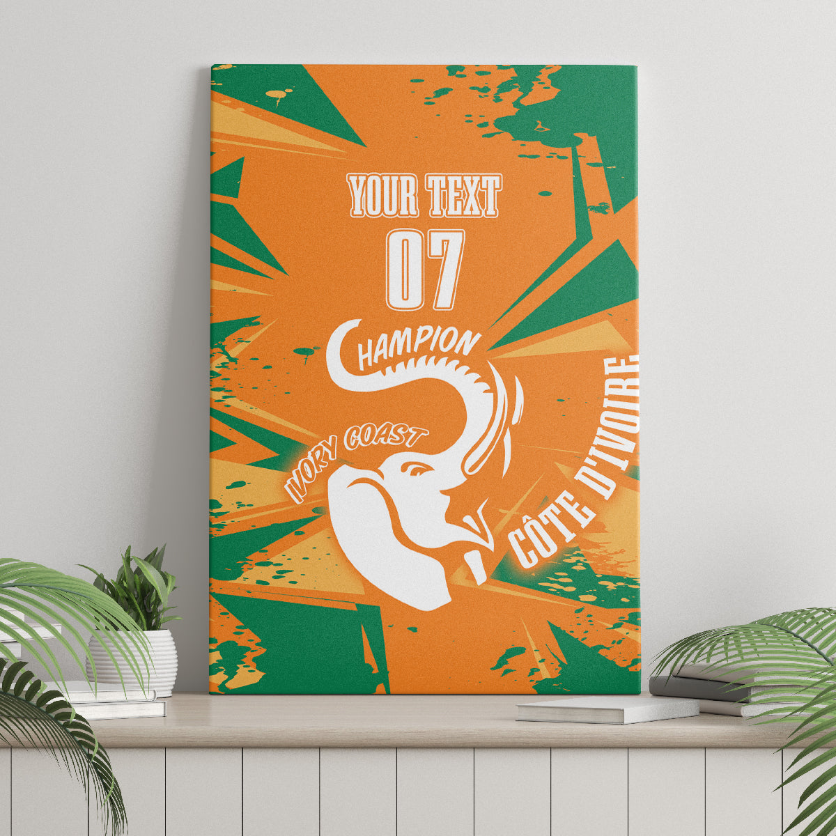Orange and green canvas wall art standing on ledge, elephant graphic with custom text 07