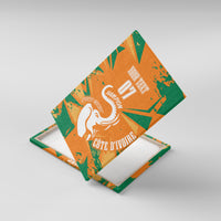 Orange and green canvas wall art shown angled, elephant graphic and custom text 07