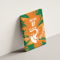 Orange and green canvas wall art on wall, elephant graphic with custom text 07 and champion