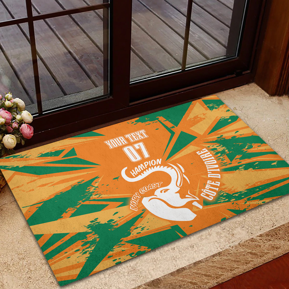 Orange-and-green rubber doormat with elephant graphic, "07 Champion" and a custom text area.