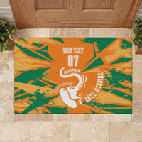 Orange rubber doormat with green starburst design and centered white elephant "07 Champion".