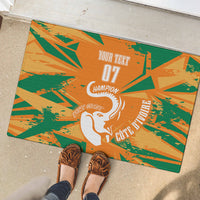 Orange rubber doormat with green pattern, white elephant, and "07 Champion" custom text.