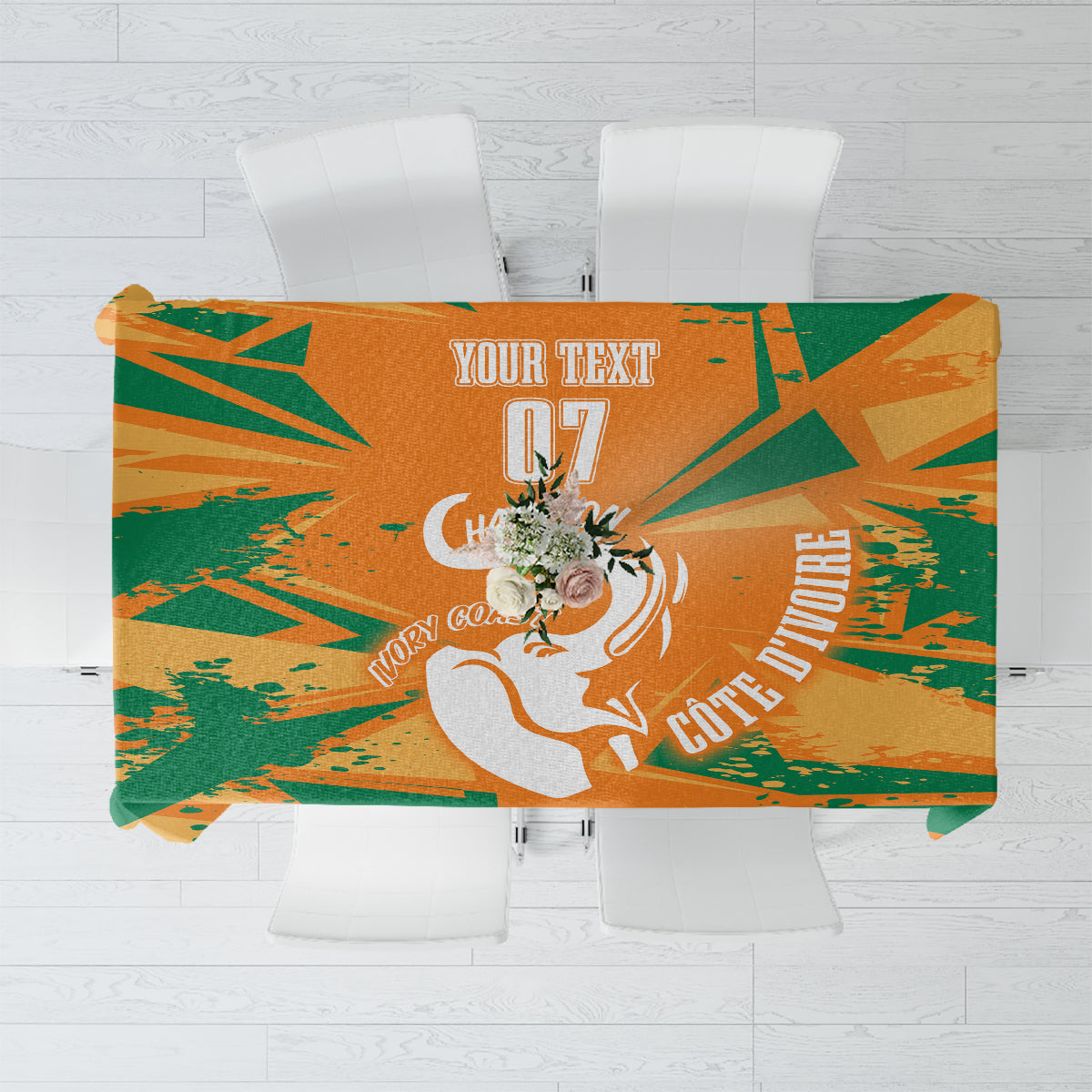 Custom orange and green elephant tablecloth with trophy emblem and geometric pattern