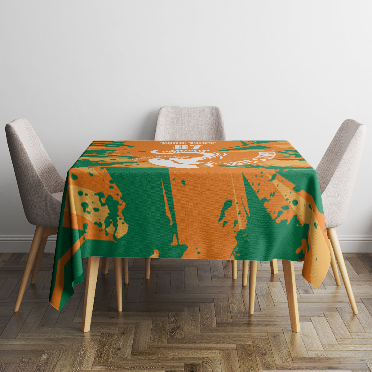 Orange and green elephant-themed custom tablecloth draped over a dining table