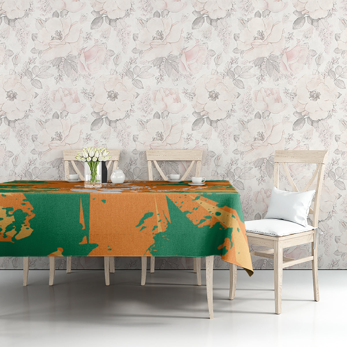 Orange and green elephant custom tablecloth covering a rectangular dining table